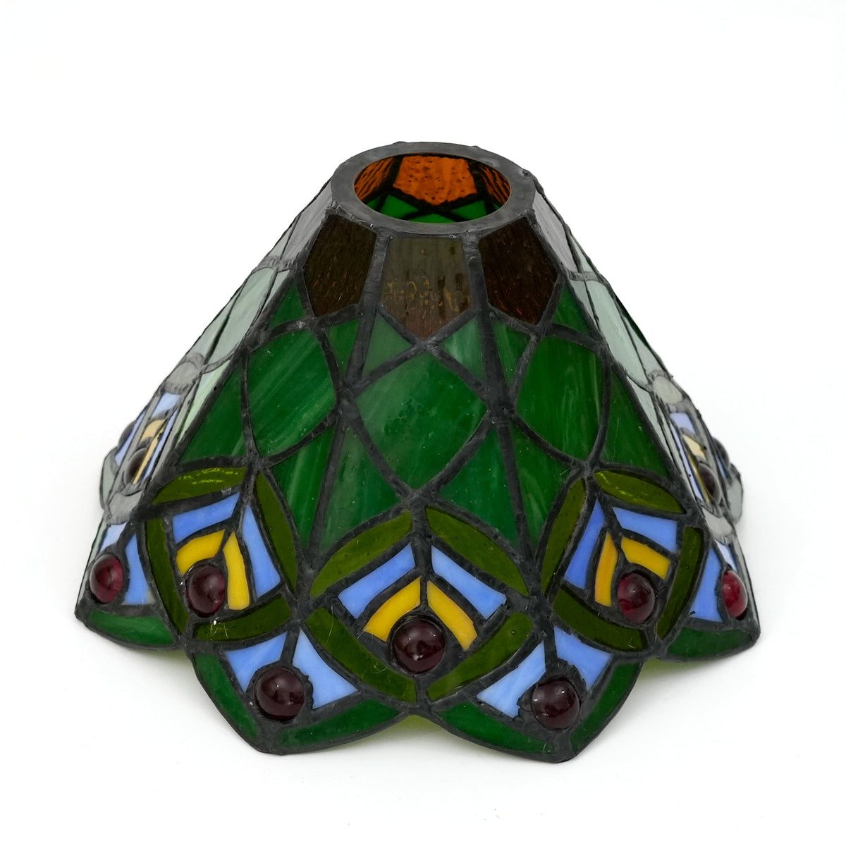 Tinted glass lampshade with patterns and red cabochons