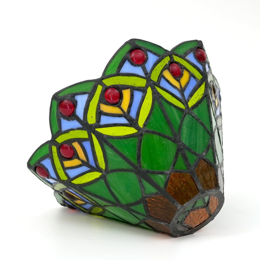 Tinted glass lampshade with patterns and red cabochons