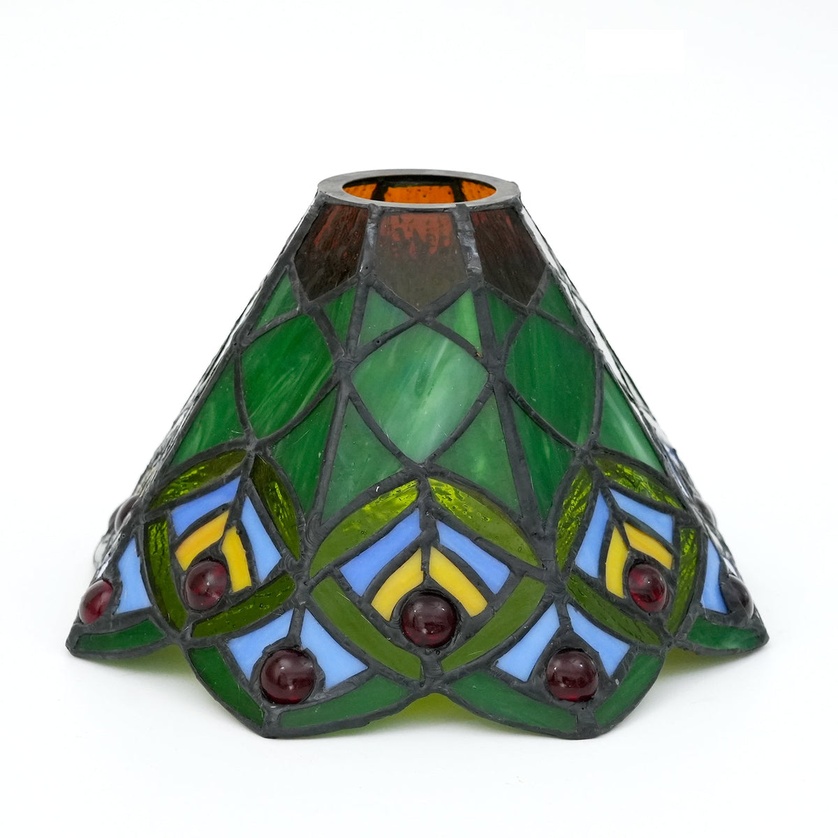 Tinted glass lampshade with patterns and red cabochons