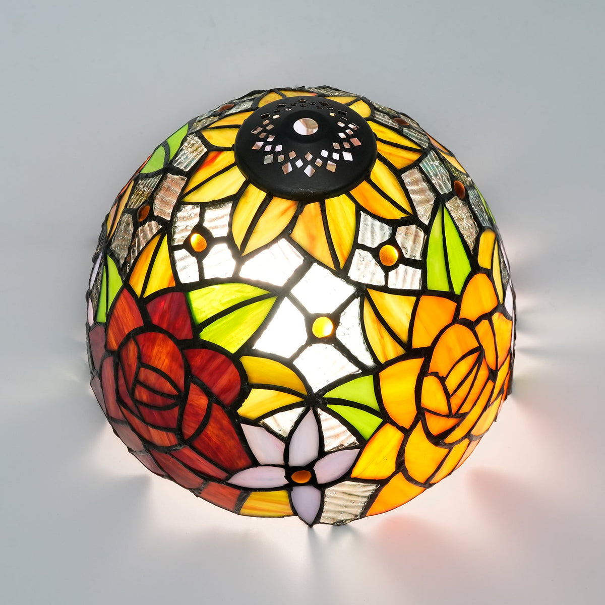 Tiffany-style tinted glass lampshade with orange roses