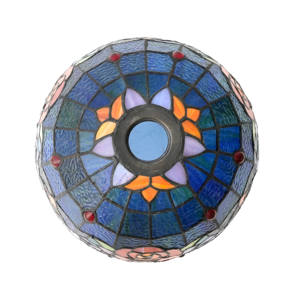 Tiffany-style tinted glass lampshade with a rose pattern