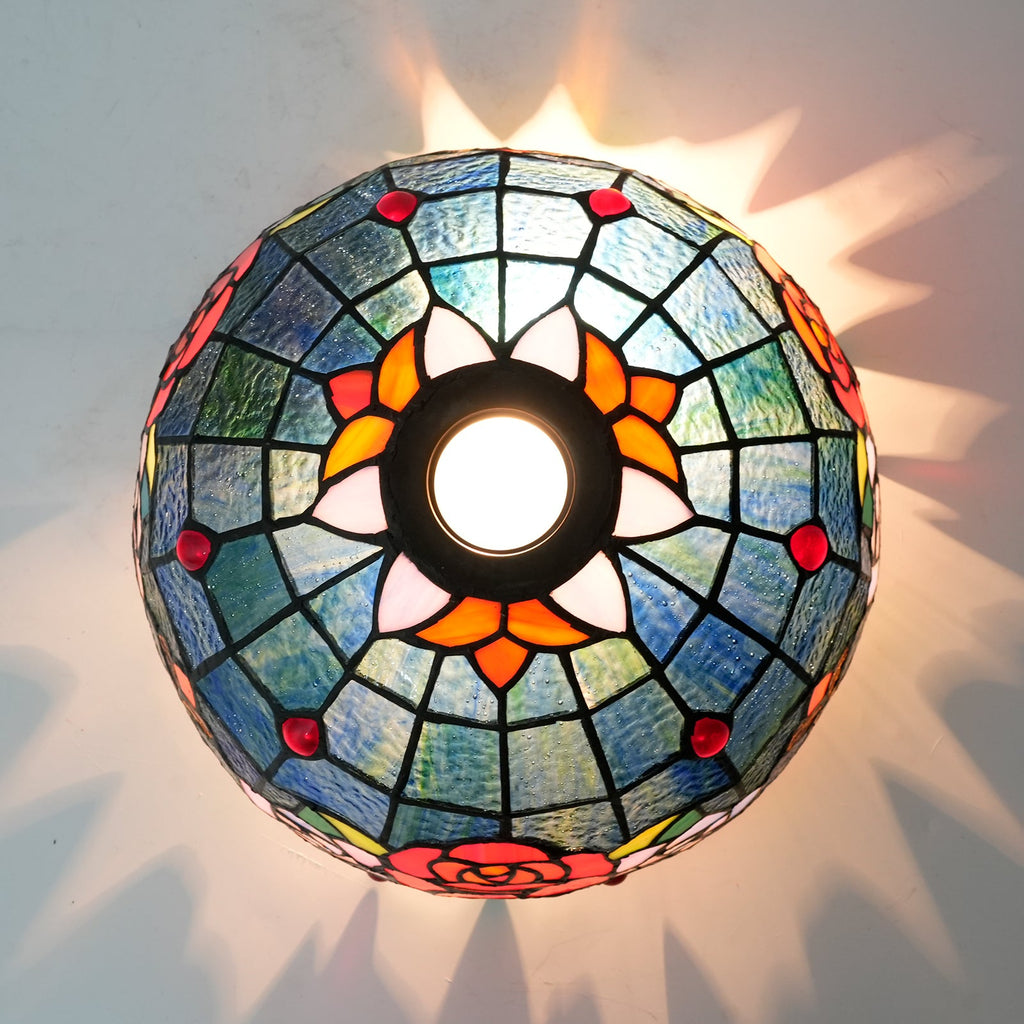 Tiffany-style tinted glass lampshade with a rose pattern
