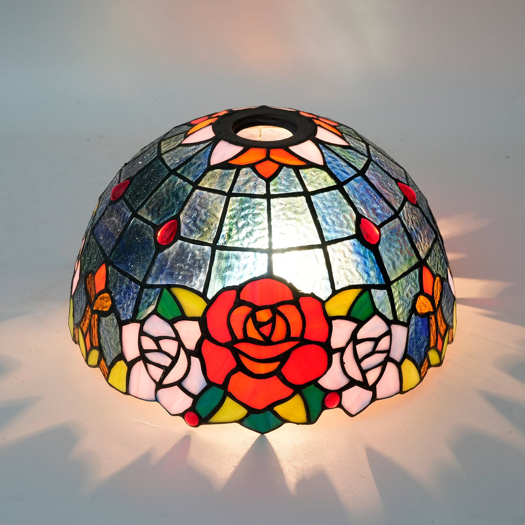 Tiffany-style tinted glass lampshade with a rose pattern