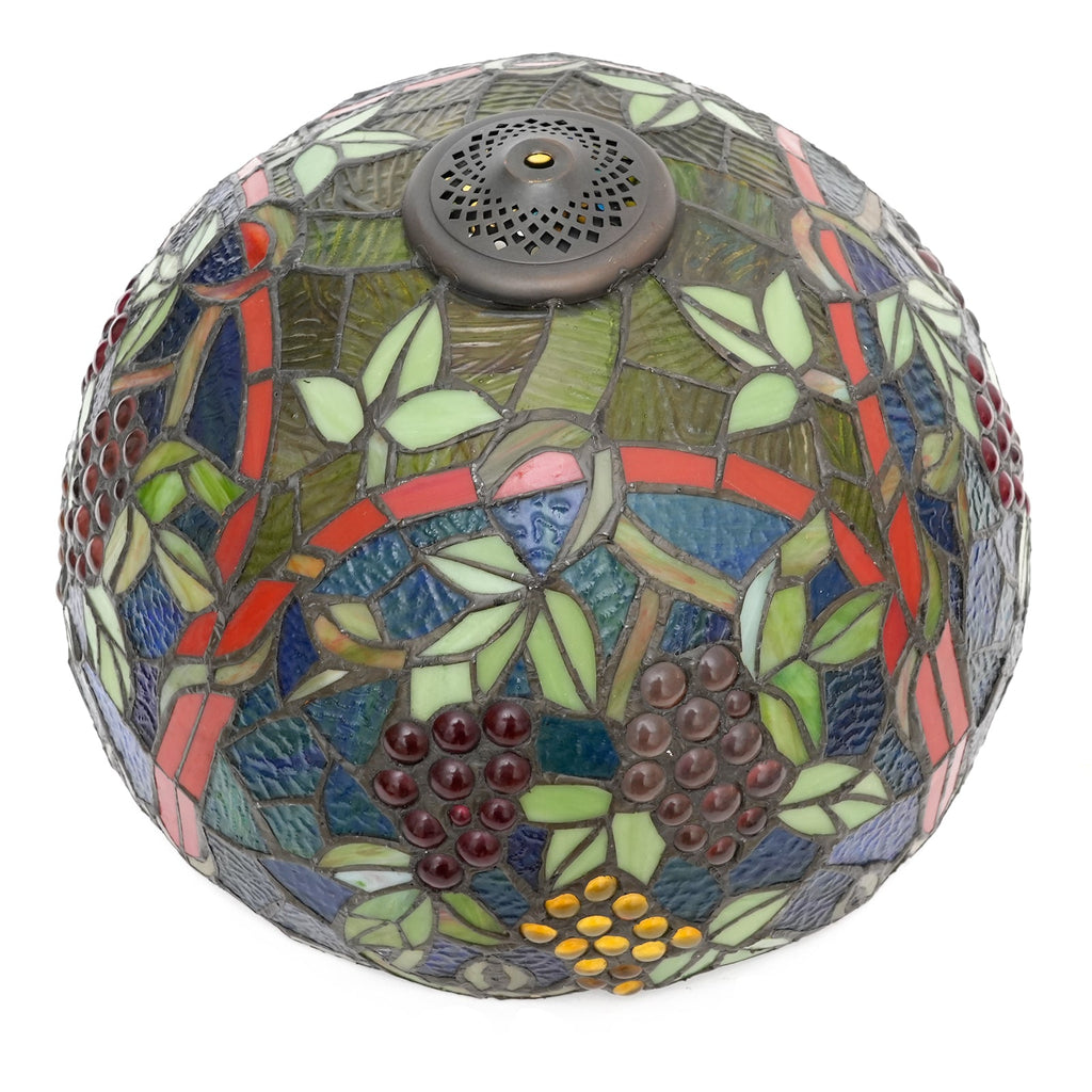 Tiffany-style lampshade in tinted glass with a grape motif