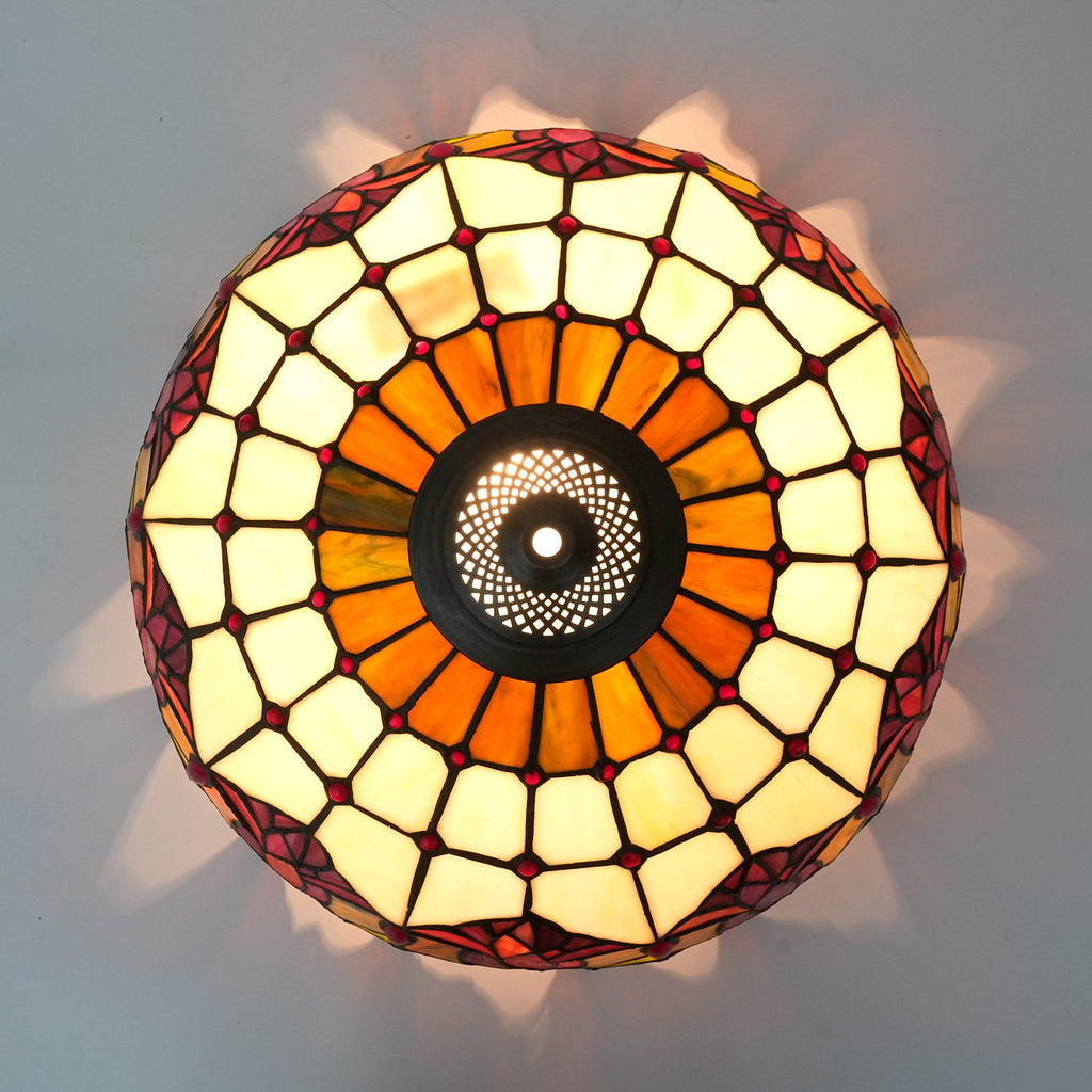 Tiffany-style lampshade in tinted glass with amber tulip patterns