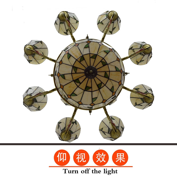 Tiffany-style chandelier in ornate bronze and stained glass