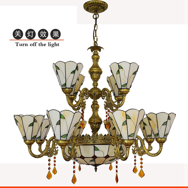 Tiffany-style chandelier in ornate bronze and stained glass