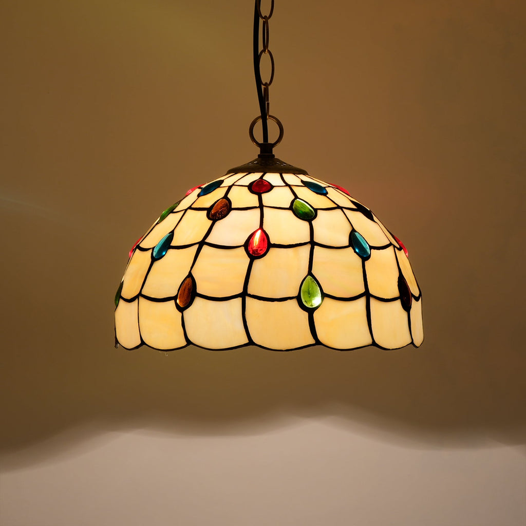 Tiffany-style stained glass pendant light in amber and multicoloured colours.