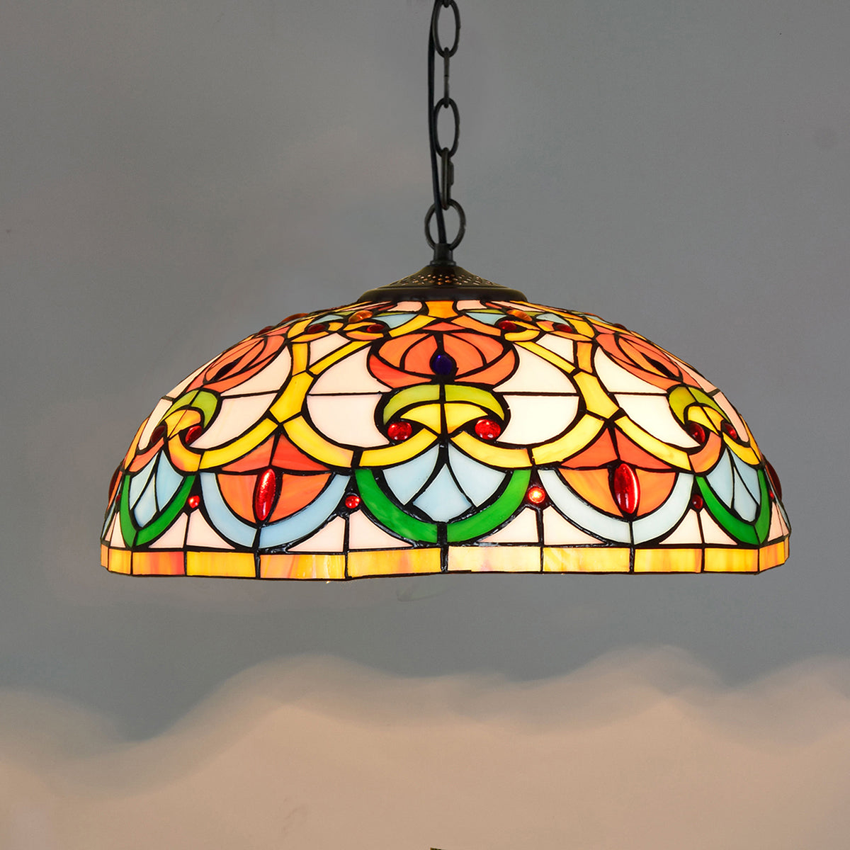 Tiffany-style stained glass pendant light in multicolored dome