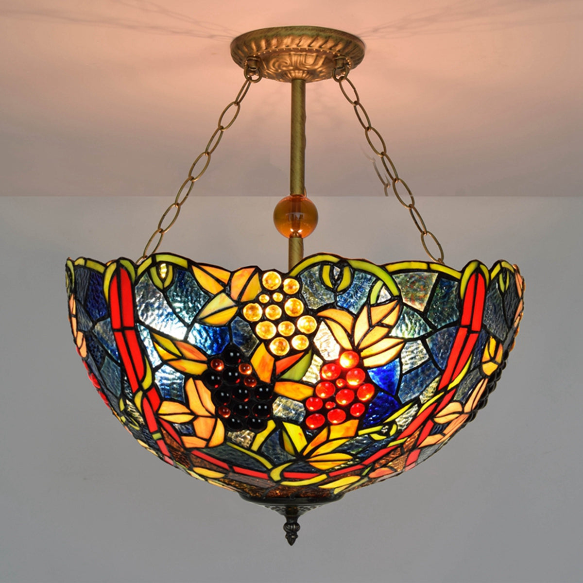 Tiffany-style stained glass pendant light with grapes