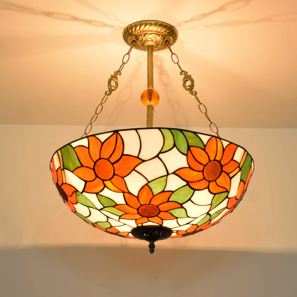 Tiffany-style glass pendant light with orange flowers