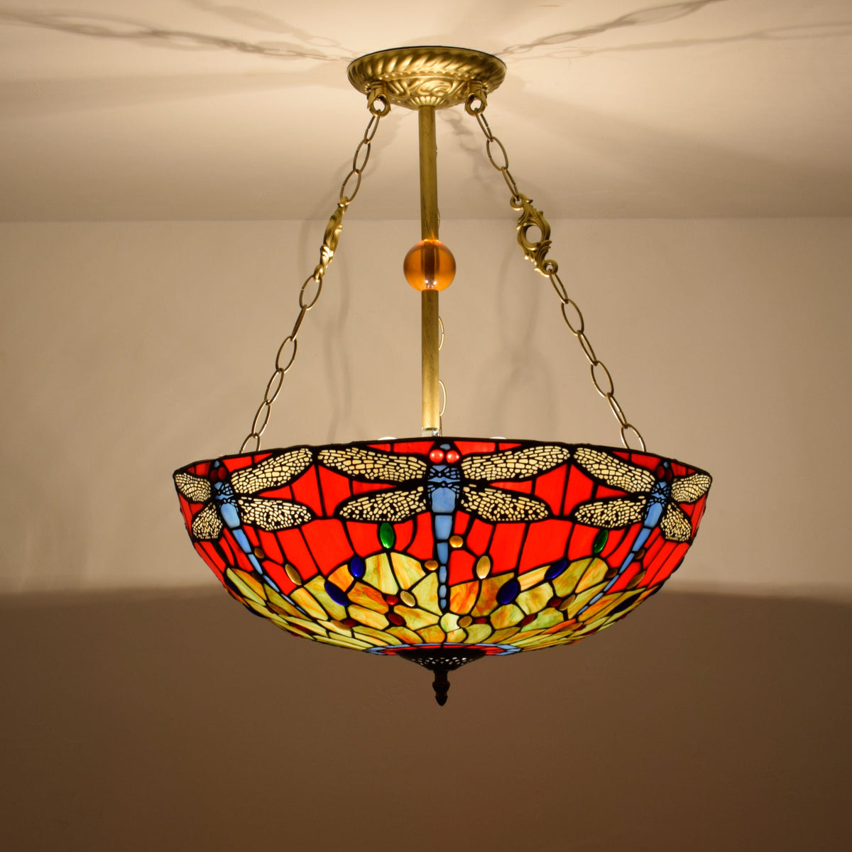 Red-tinted glass Tiffany chandelier with dragonflies