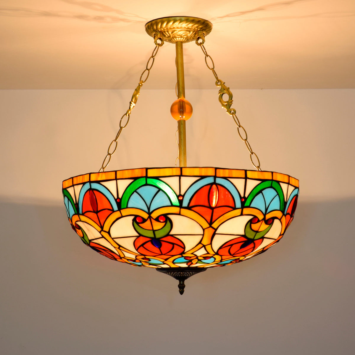 Tiffany stained glass and gilded wrought iron pendant light