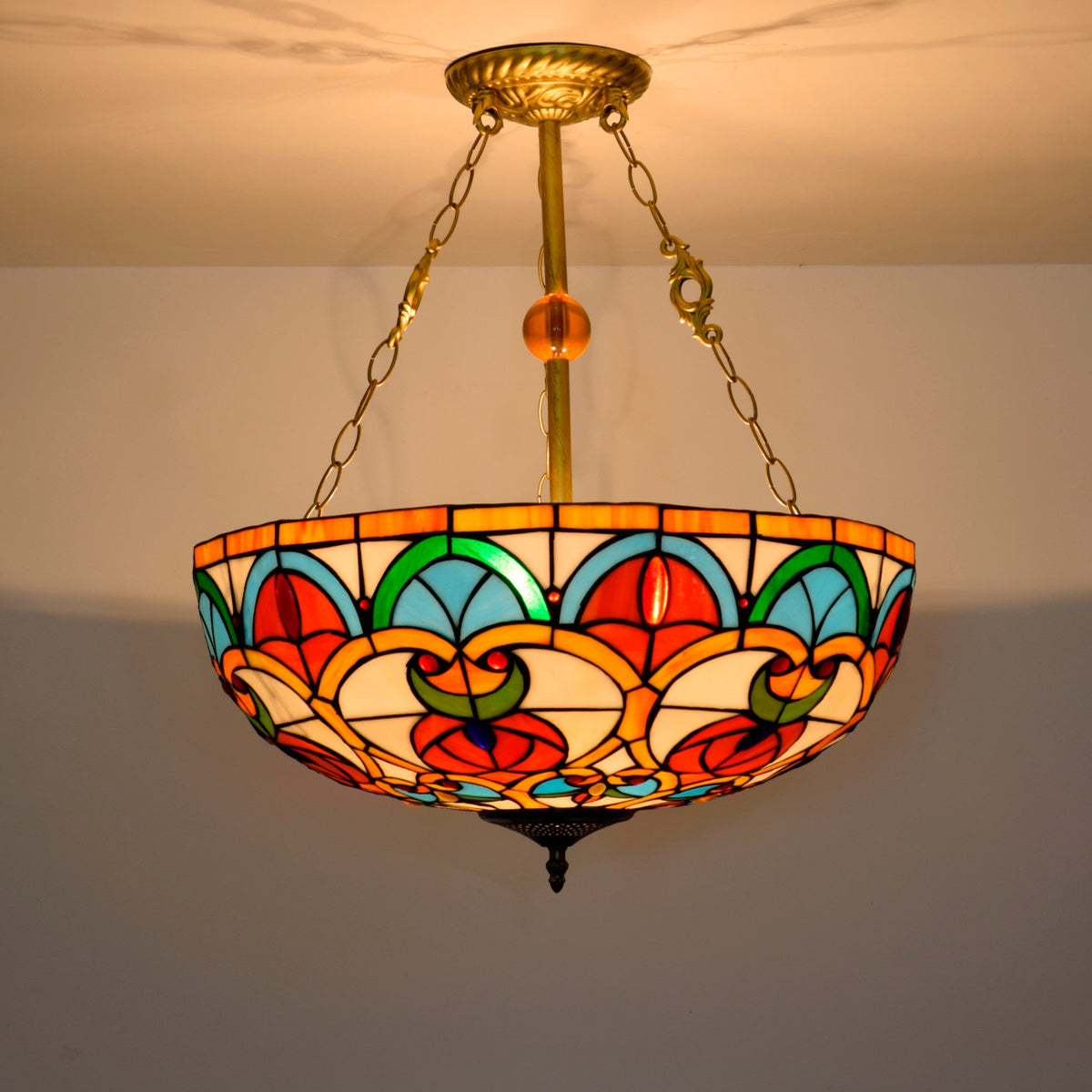 Tiffany stained glass and gilded wrought iron pendant light