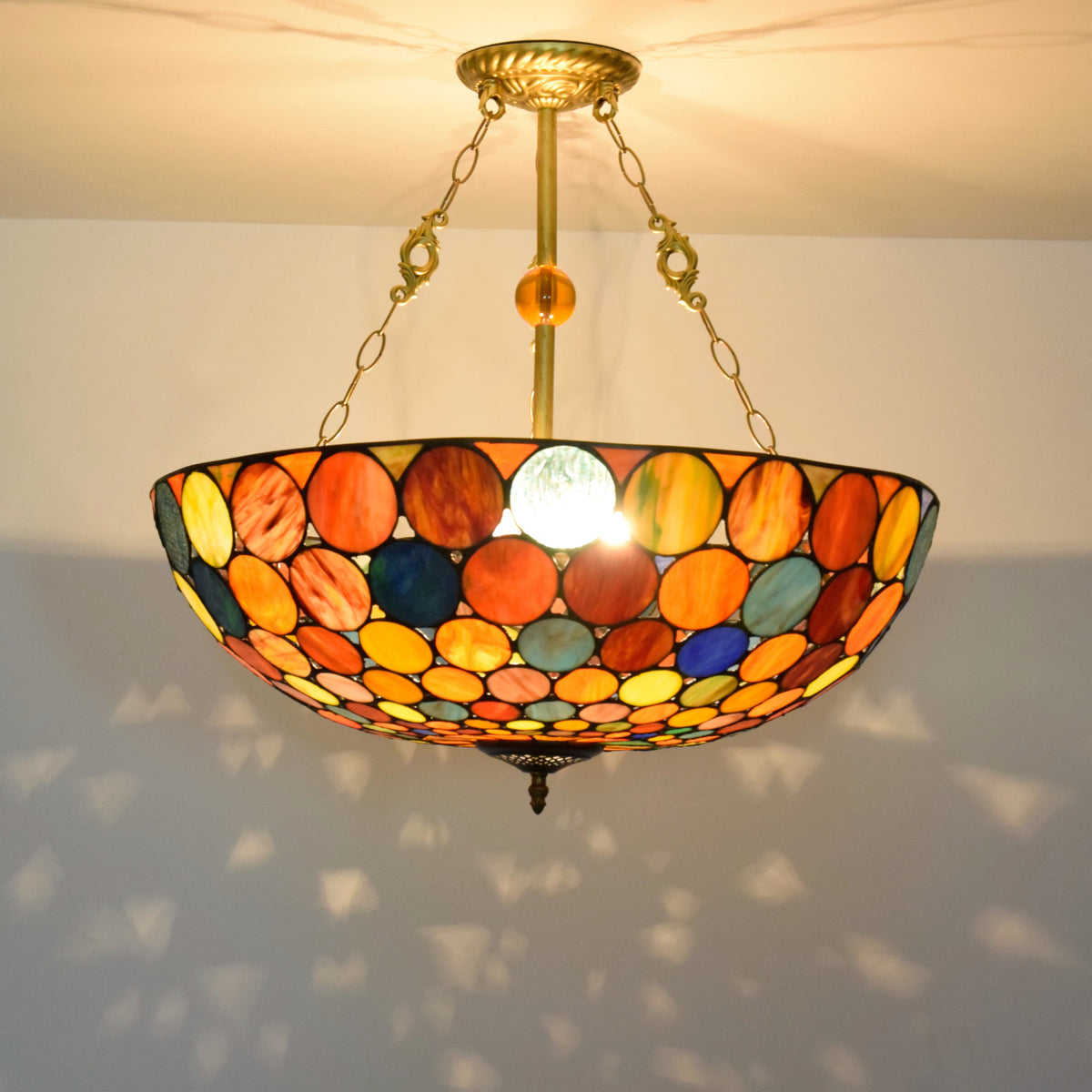 Tiffany-style pendant light in multicolored tinted glass