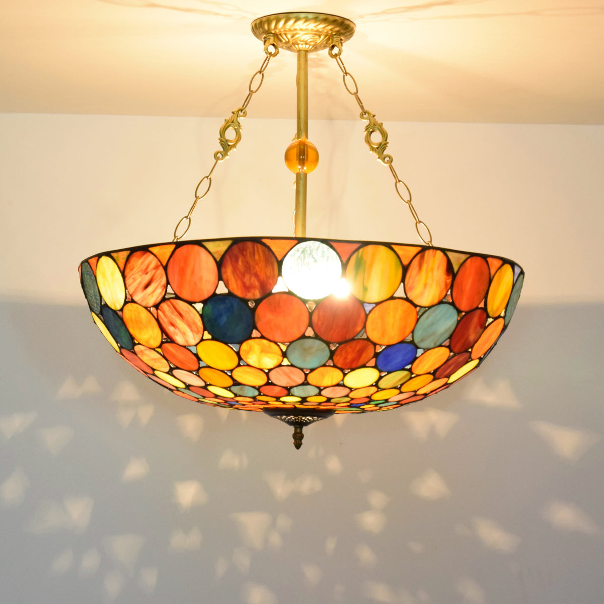 Tiffany-style pendant light in multicolored tinted glass