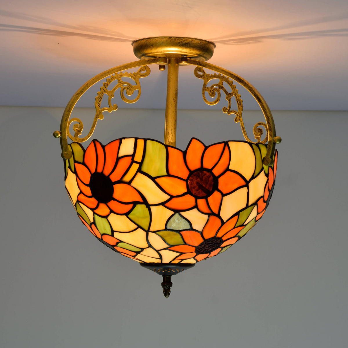 Tiffany-style ceiling light adorned with orange flowers