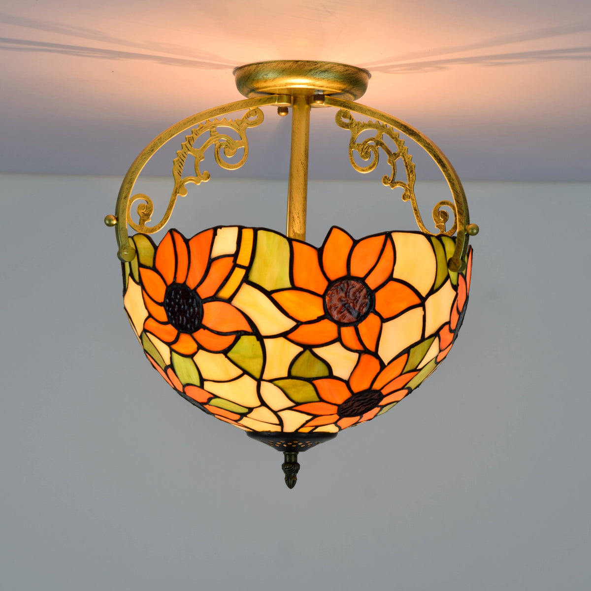 Tiffany-style ceiling light adorned with orange flowers