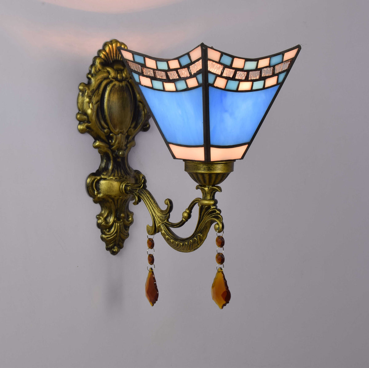 Tiffany Style Wall Sconce in Bronze and Blue Stained Glass