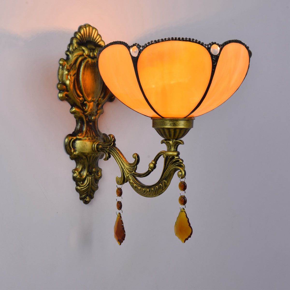 Vintage Wall Sconce in Aged Bronze and Amber Stained Glass
