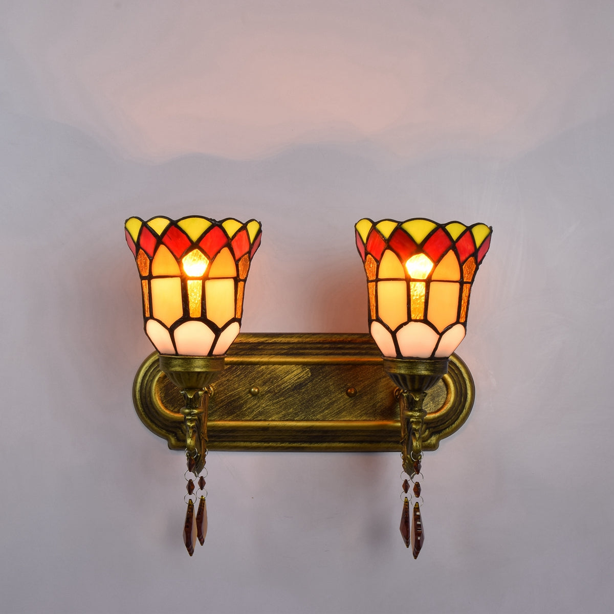 Double Tiffany Style Wall Sconce in Aged Bronze