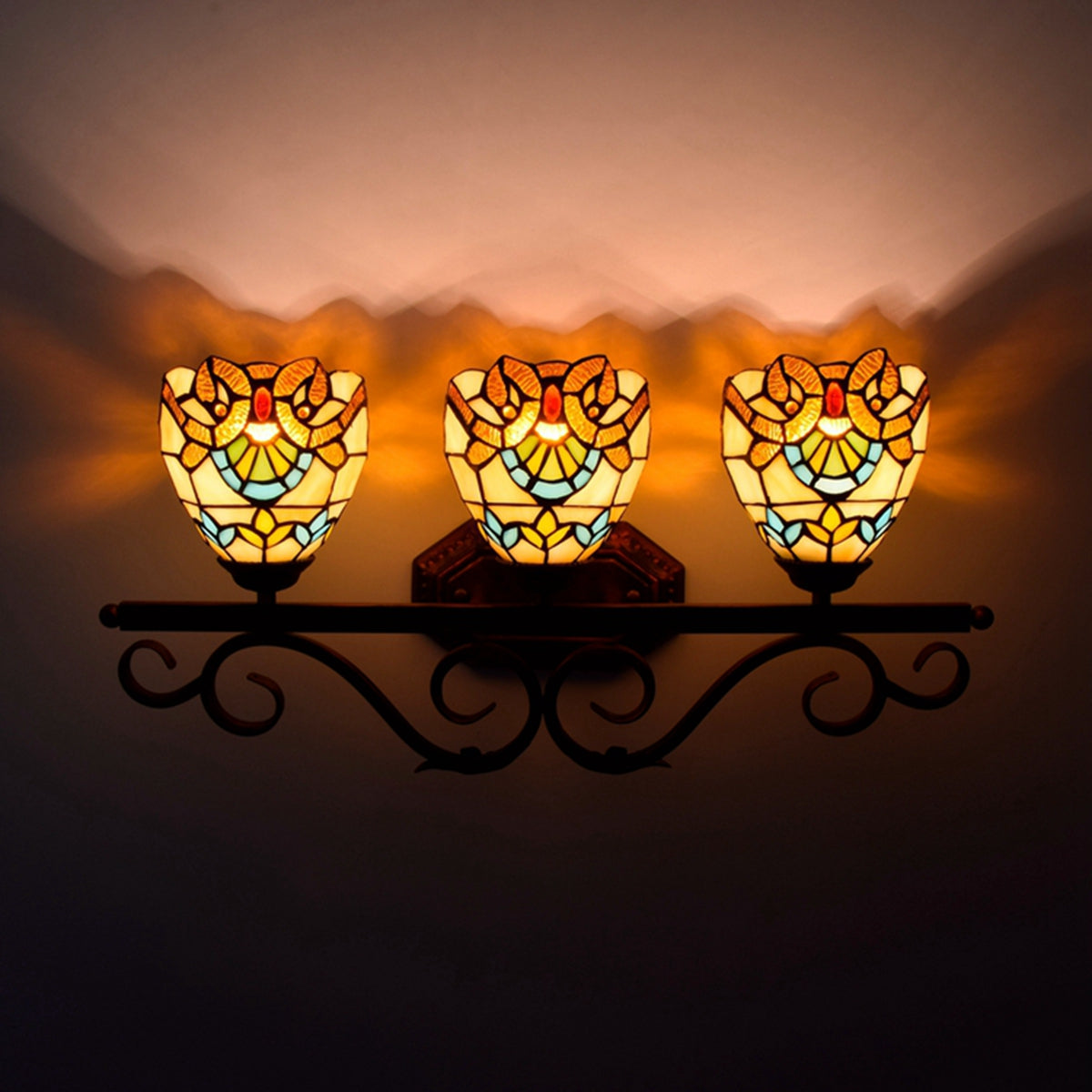 Triple Stained Glass Tiffany Wall Sconce in Aged Bronze