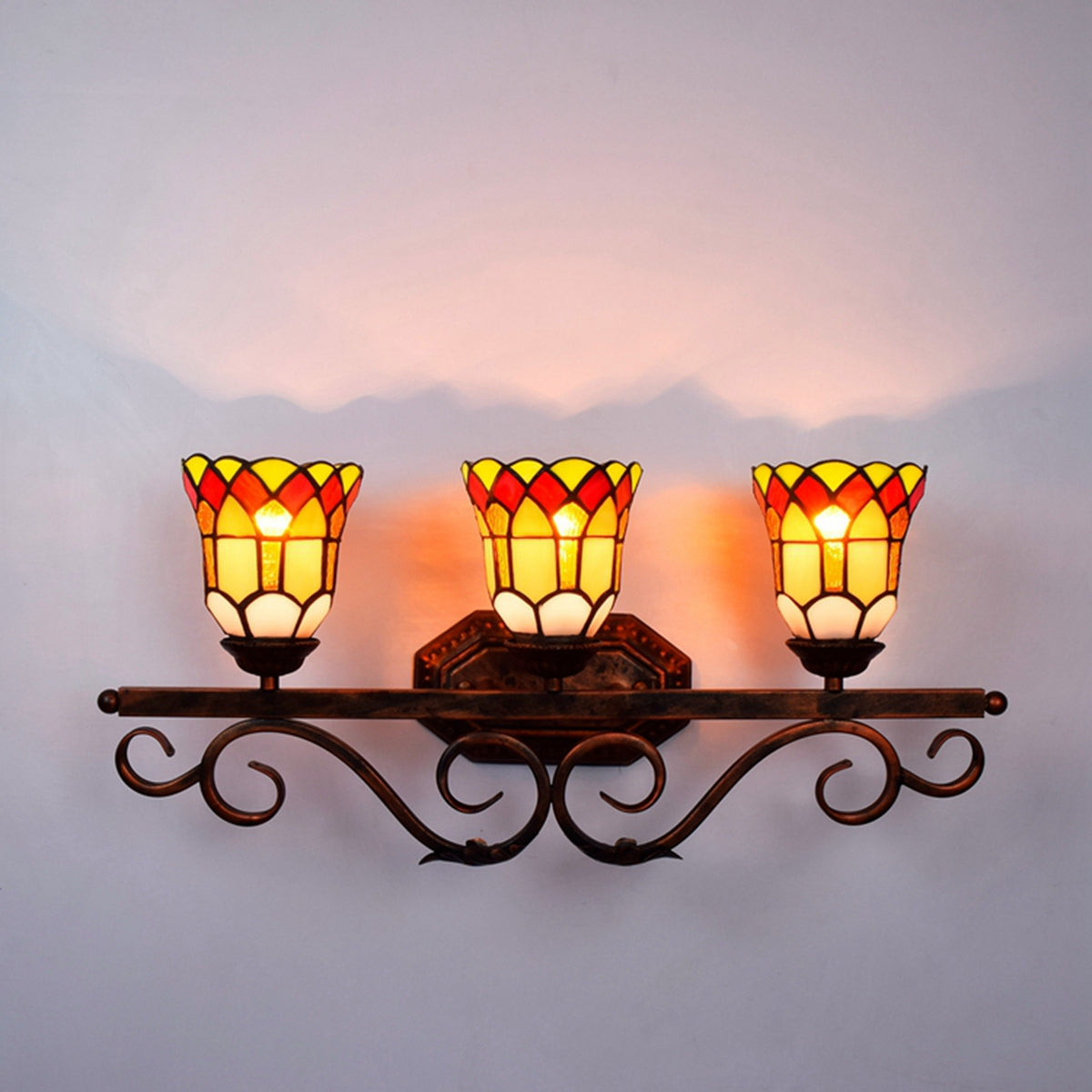Tiffany Style Triple Wall Sconce in Ornate Metal