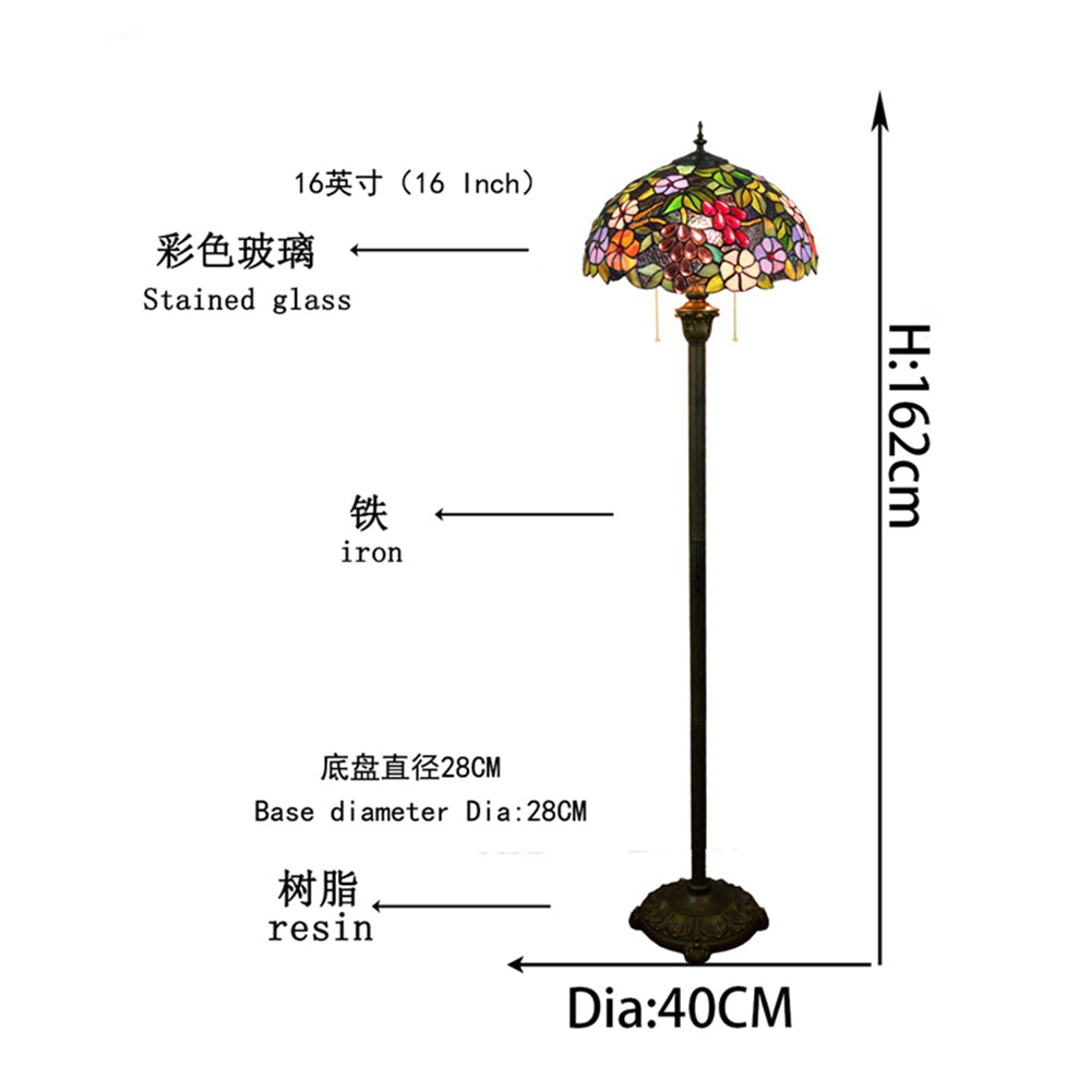 Tiffany-style lamp in stained glass with floral and grape cluster motifs