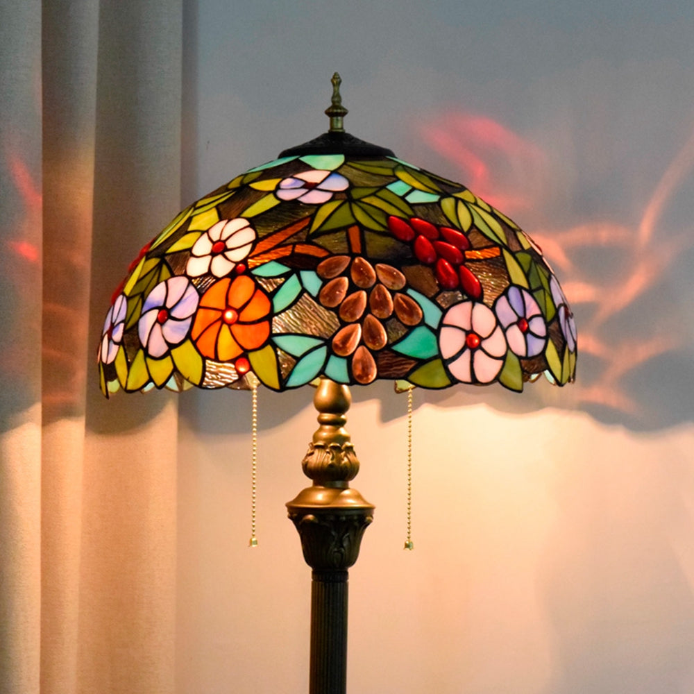 Tiffany-style lamp in stained glass with floral and grape cluster motifs