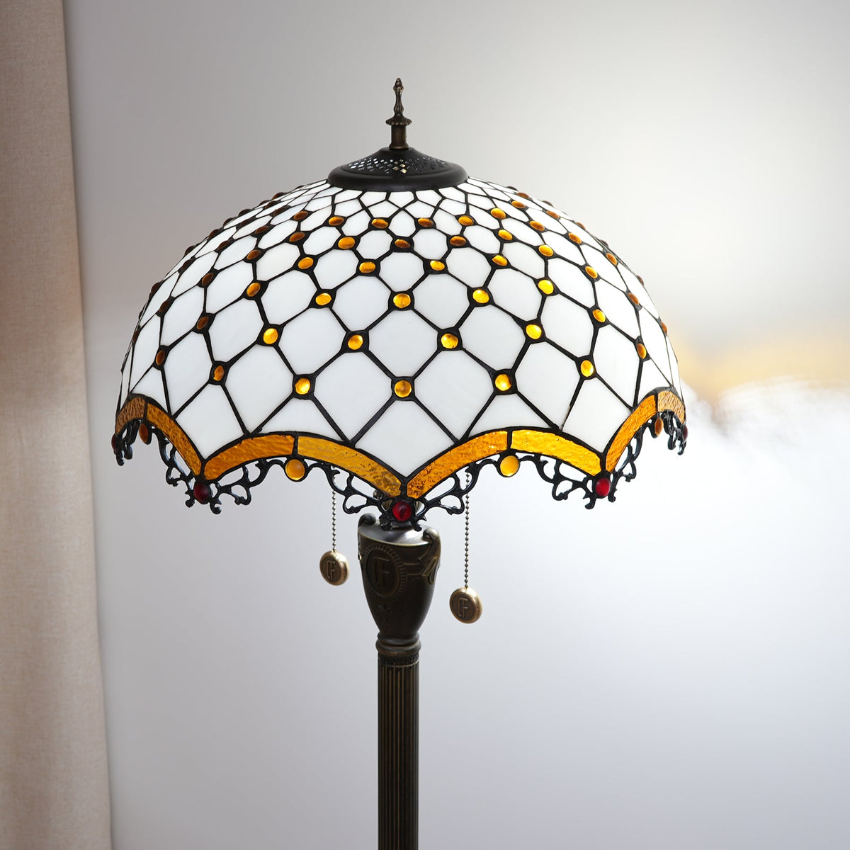 Tiffany floor lamp in white, amber and red stained glass