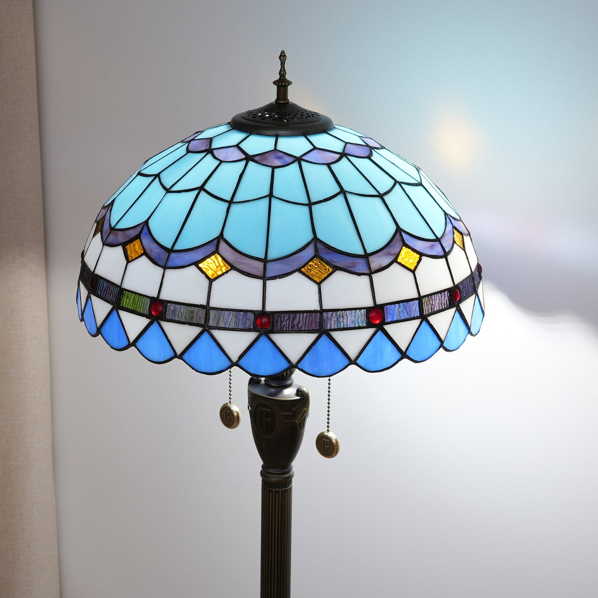 Tiffany-style blue stained glass floor lamp with bronze base