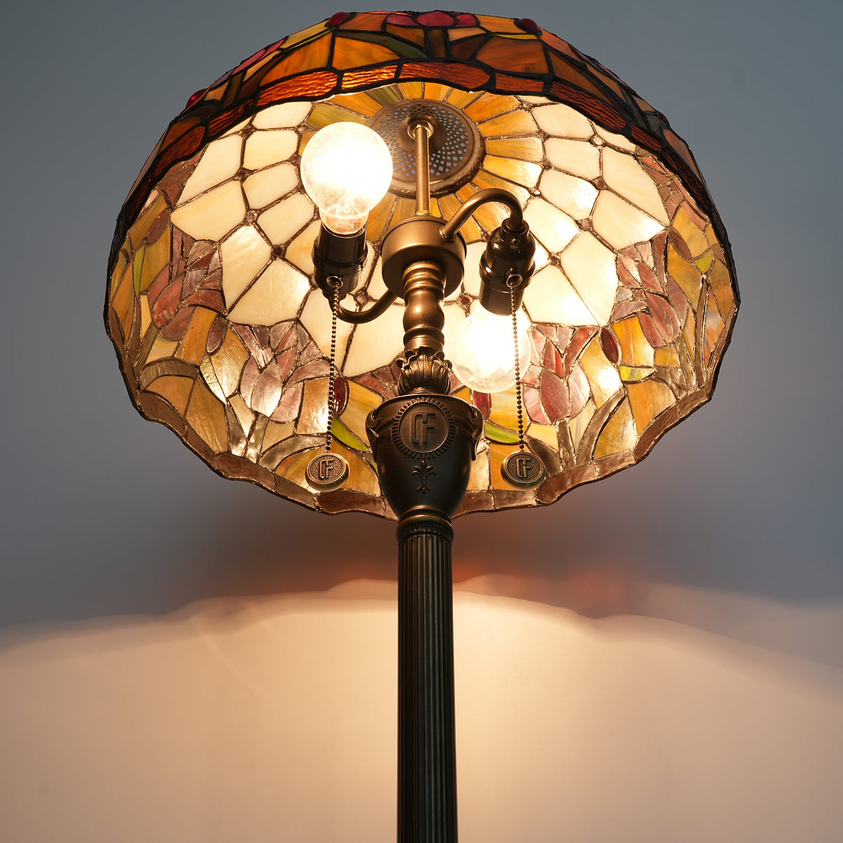 Tiffany-style stained glass floor lamp with floral motifs