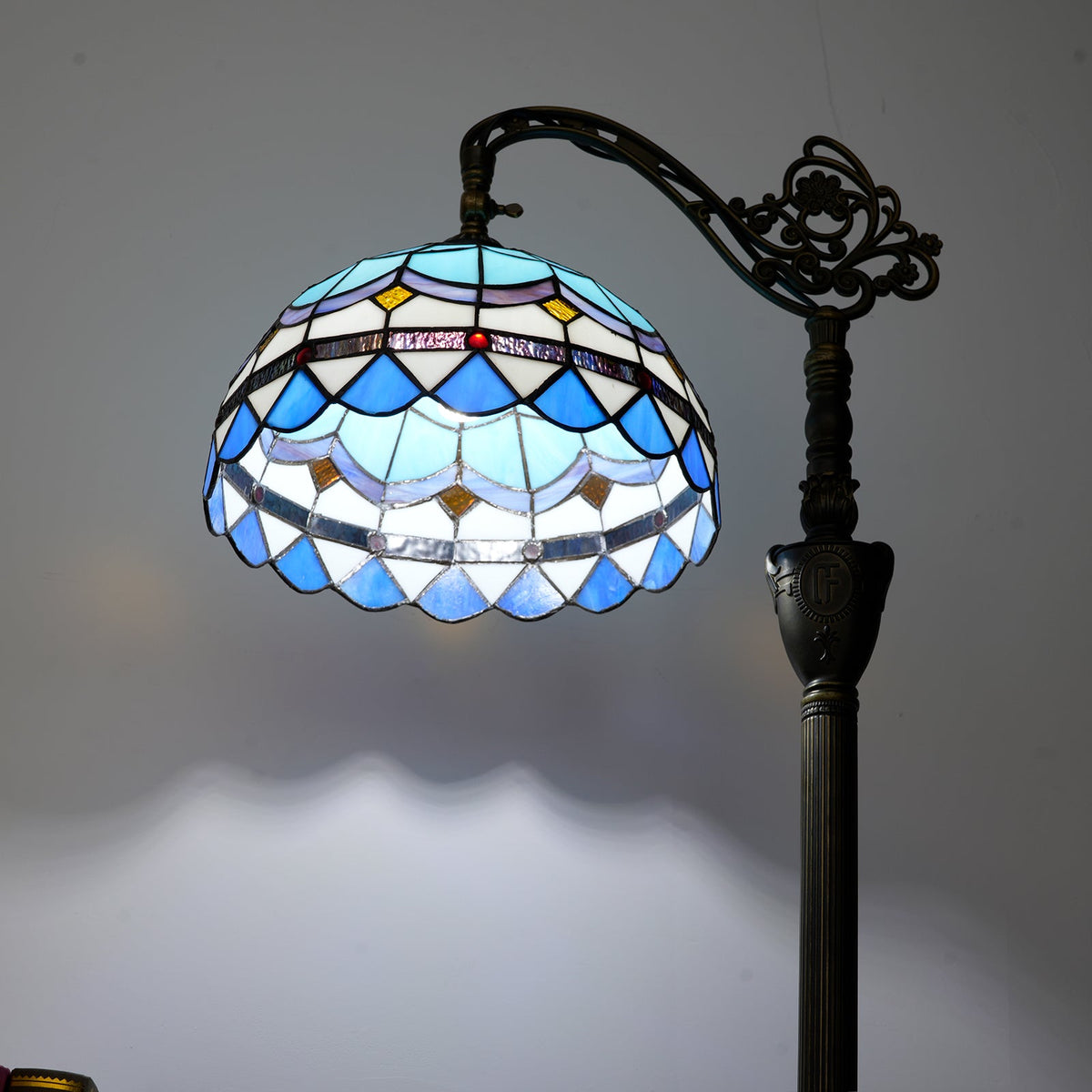 Tiffany-style floor lamp in blue and amber stained glass