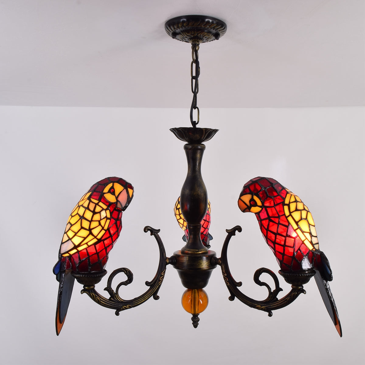 Tiffany stained glass chandelier with three parrots