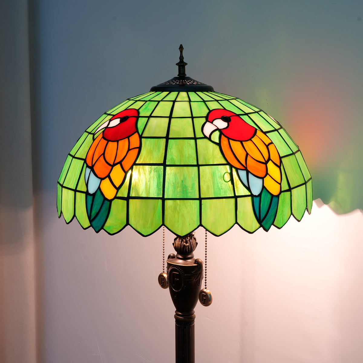 Tiffany-style floor lamp in green stained glass with parrots