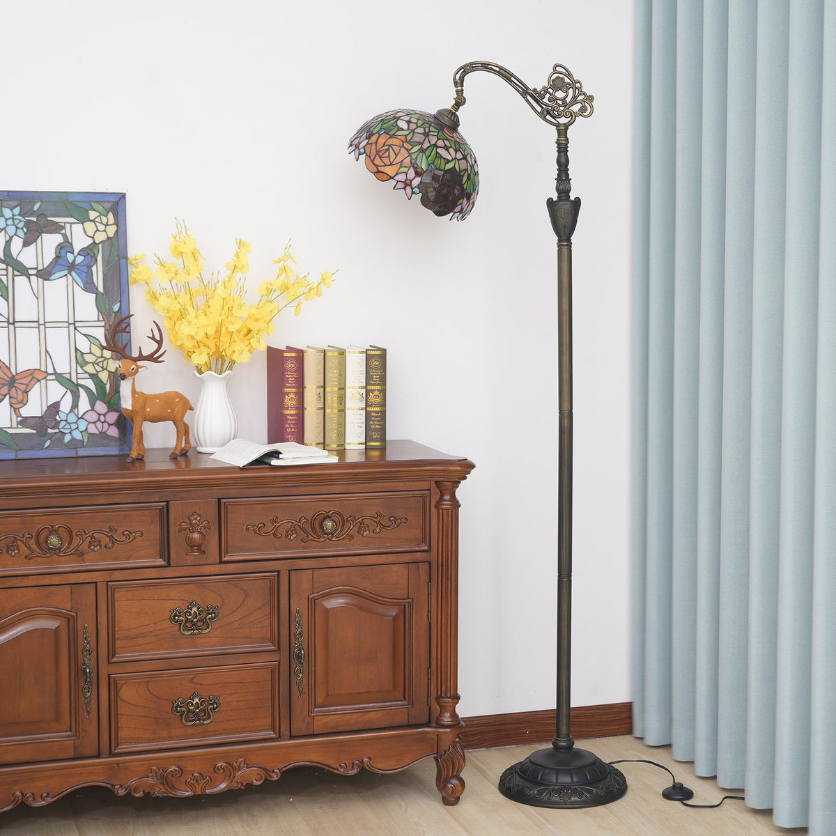 Tiffany stained glass floor lamp with roses and sculpted base