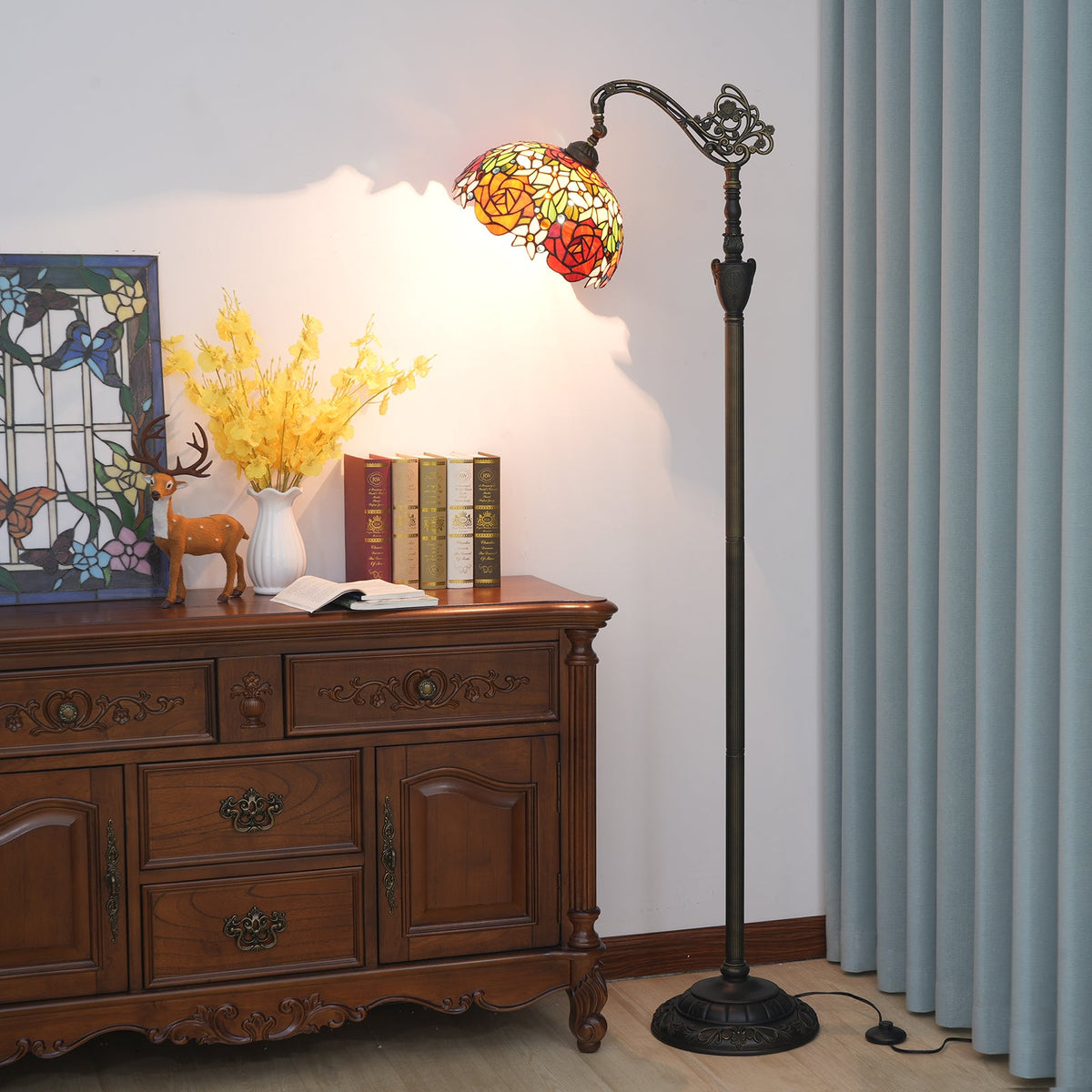 Tiffany stained glass floor lamp with roses and sculpted base