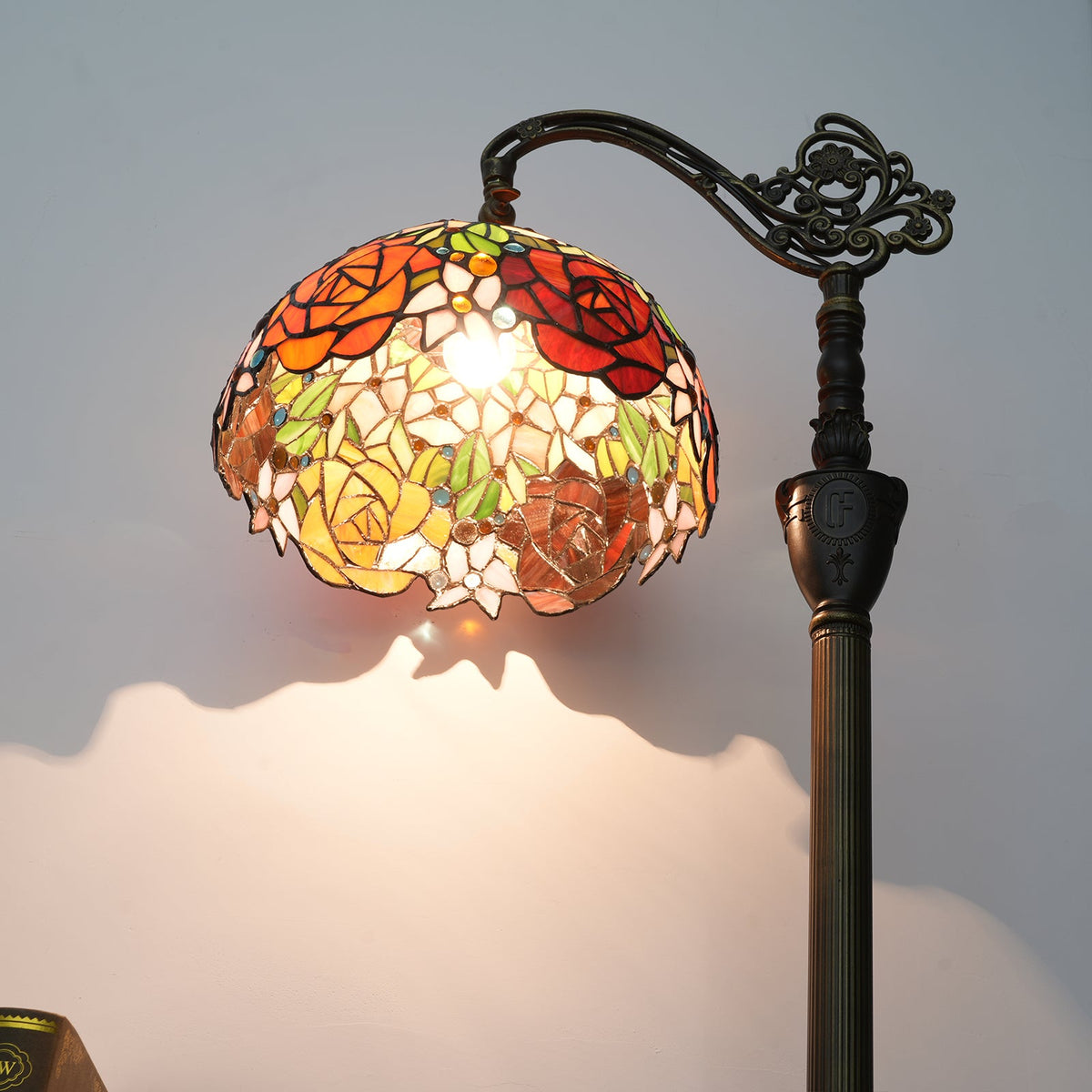 Tiffany stained glass floor lamp with roses and sculpted base
