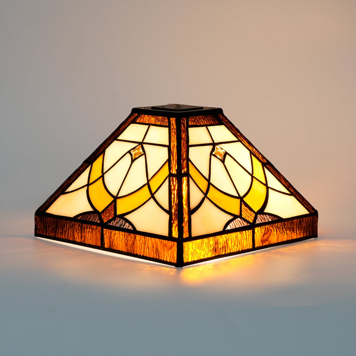 Tiffany-style lampshade in cream and amber tinted glass