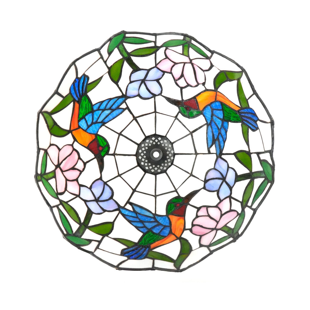 Tiffany-style lampshade in stained glass with a hummingbird and flower design.