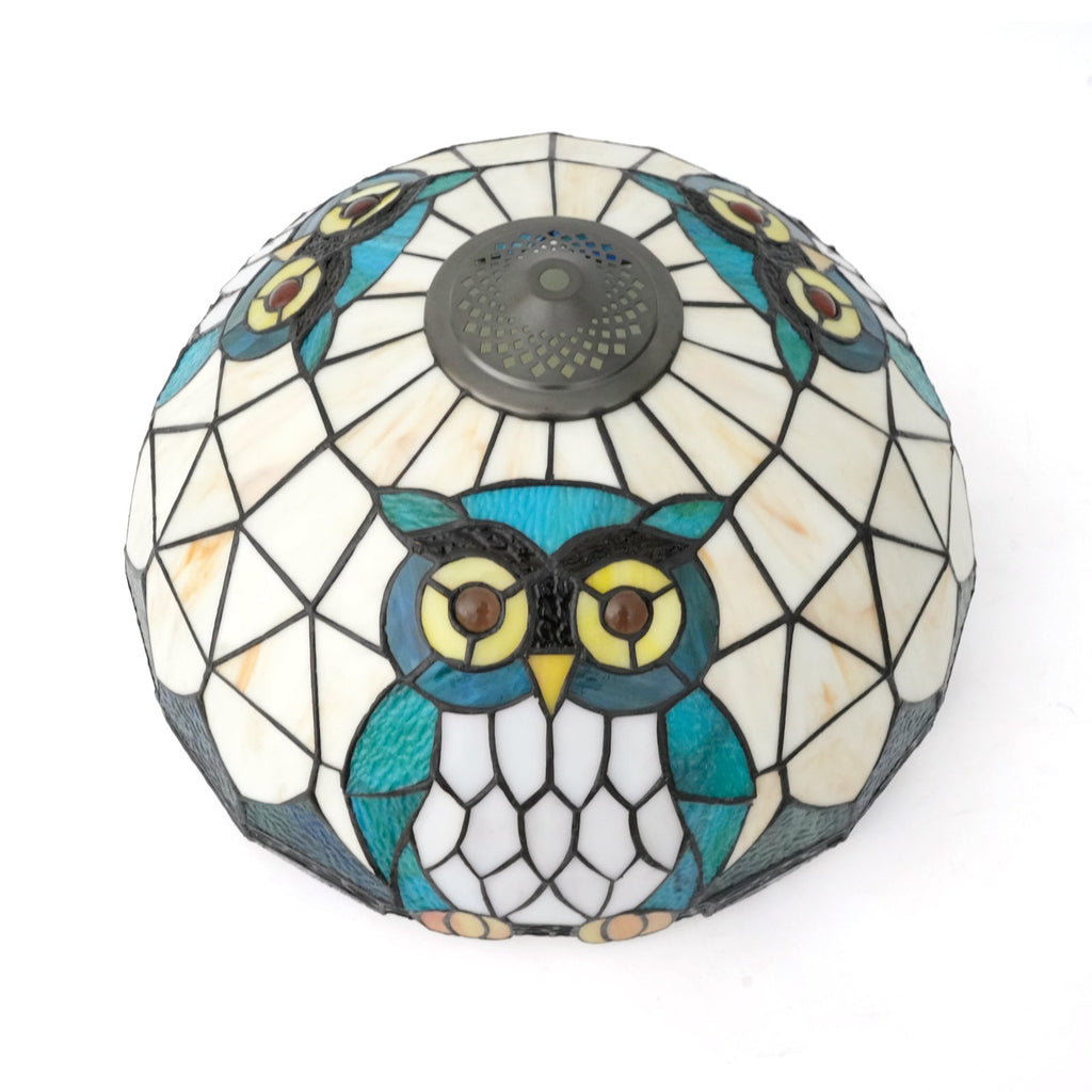 Tiffany-style stained glass lampshade with a blue-green owl design