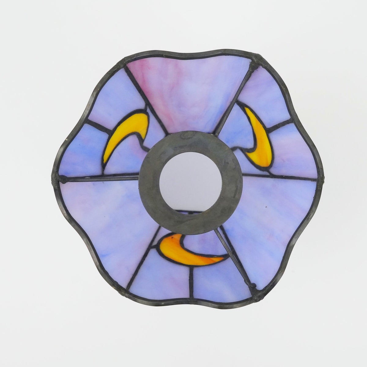 Stained glass lampshade in purple with a yellow crescent moon