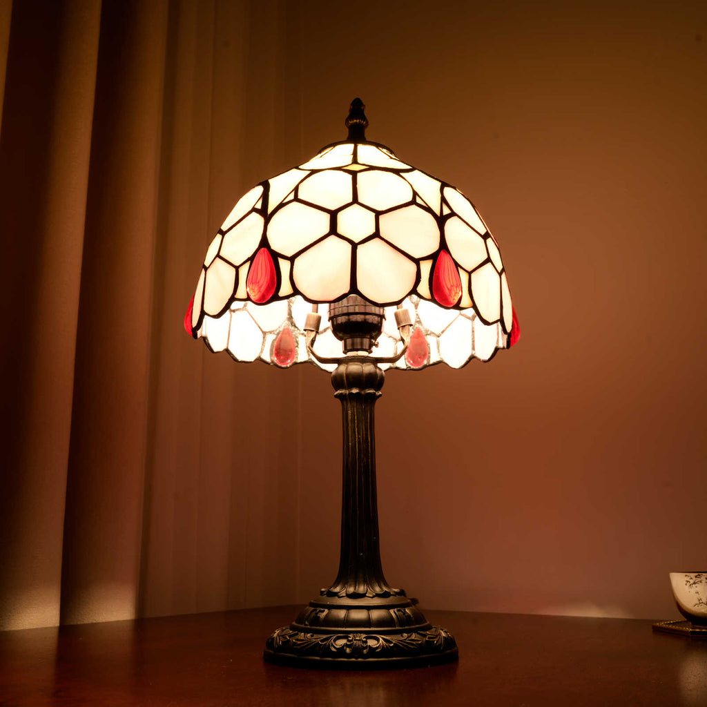 Tiffany-style stained glass table lamp in pink and red drops