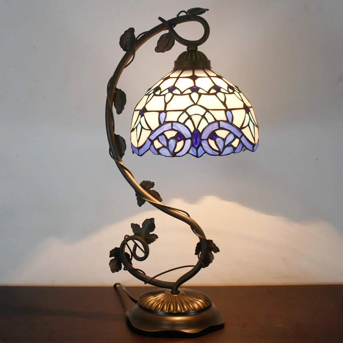 White and blue stained-glass style metal bedside table, rustic western industrial style, living room, bedroom, Tiffany desk lamp