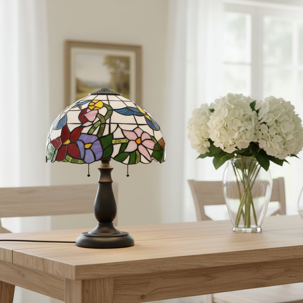 Tiffany-style stained glass lampshade with hummingbird and flower design