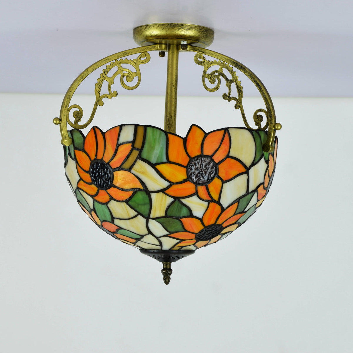 Tiffany-style ceiling light adorned with orange flowers