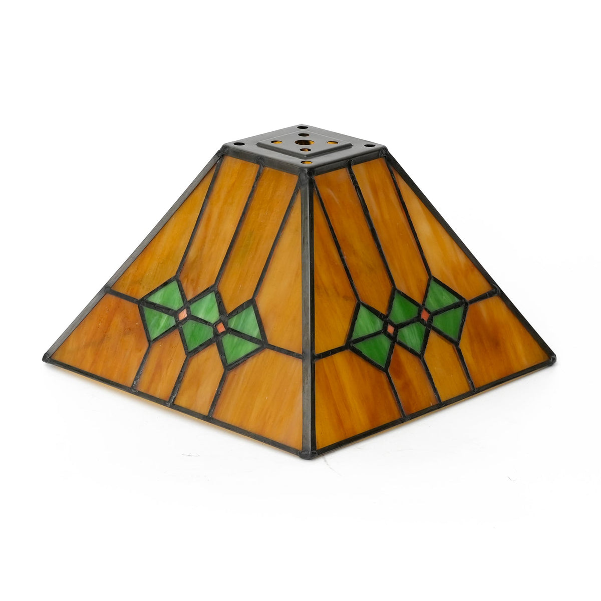 Tiffany-style glass lampshade in amber, green, and pink