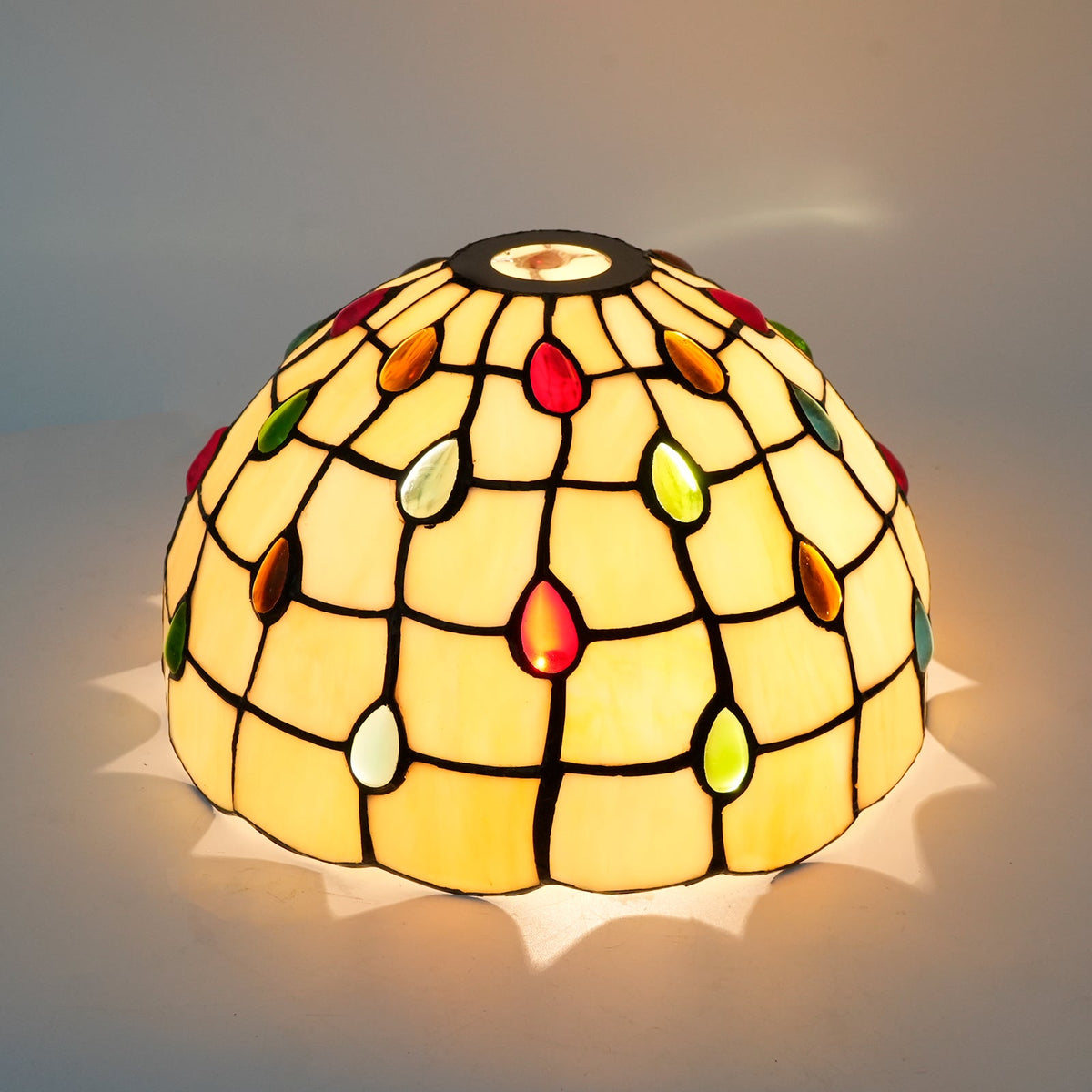 Tiffany-style glass lampshade with multicolored droplets