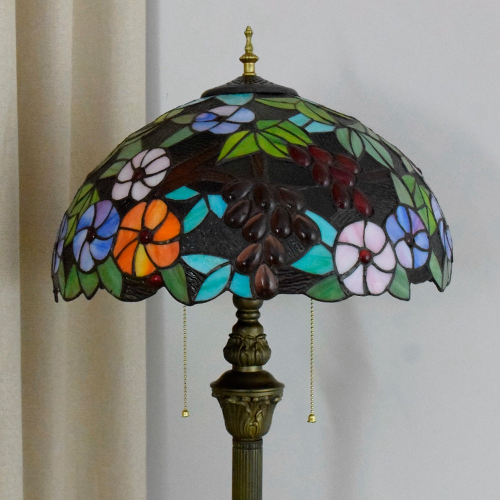 Tiffany-style lamp in stained glass with floral and grape cluster motifs