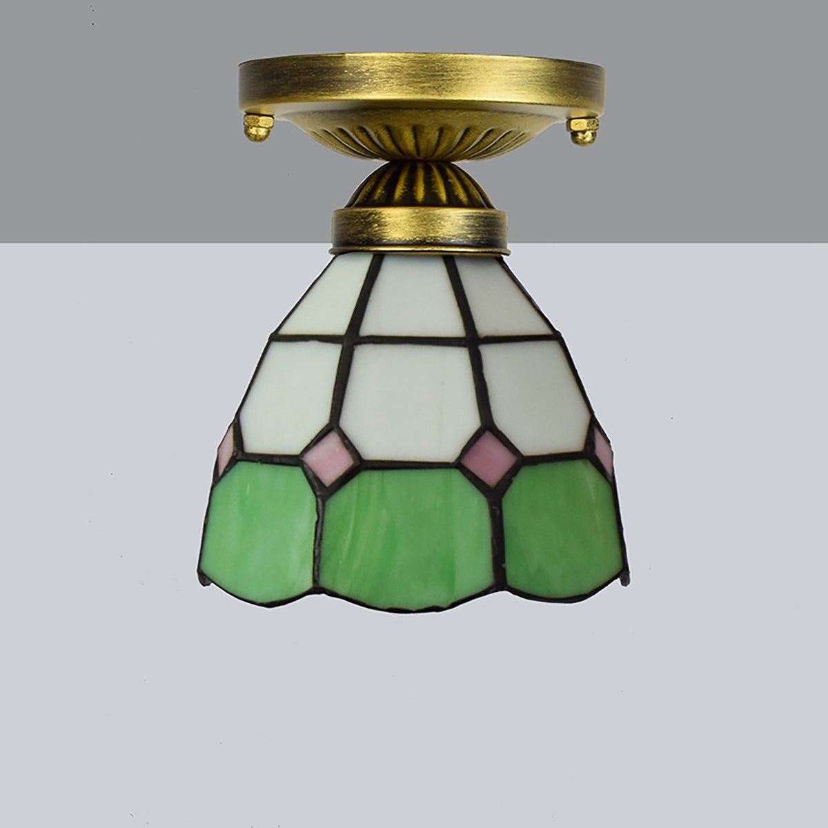 Tiffany-style stained glass ceiling light in green, white, and pink
